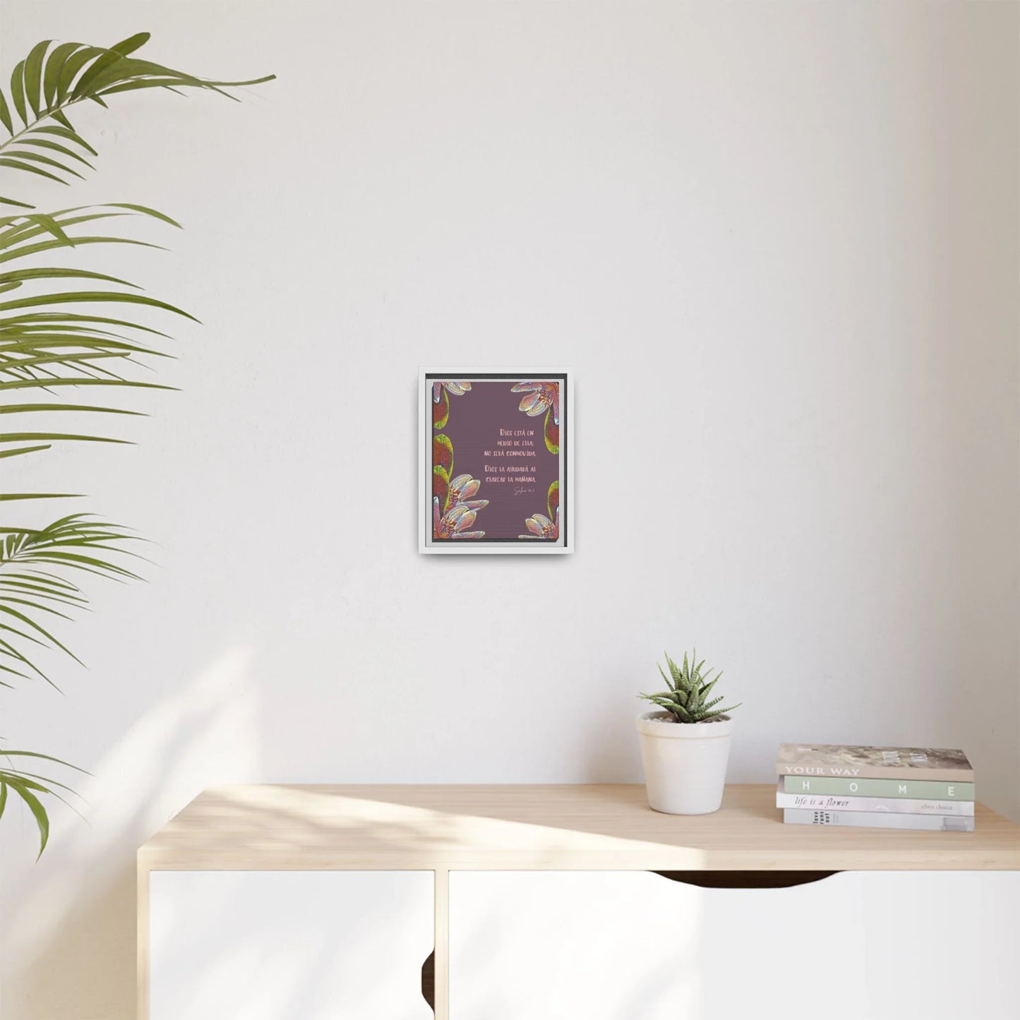 Framed Christian wall art with floral border, Spanish scripture, on modern home decor shelf