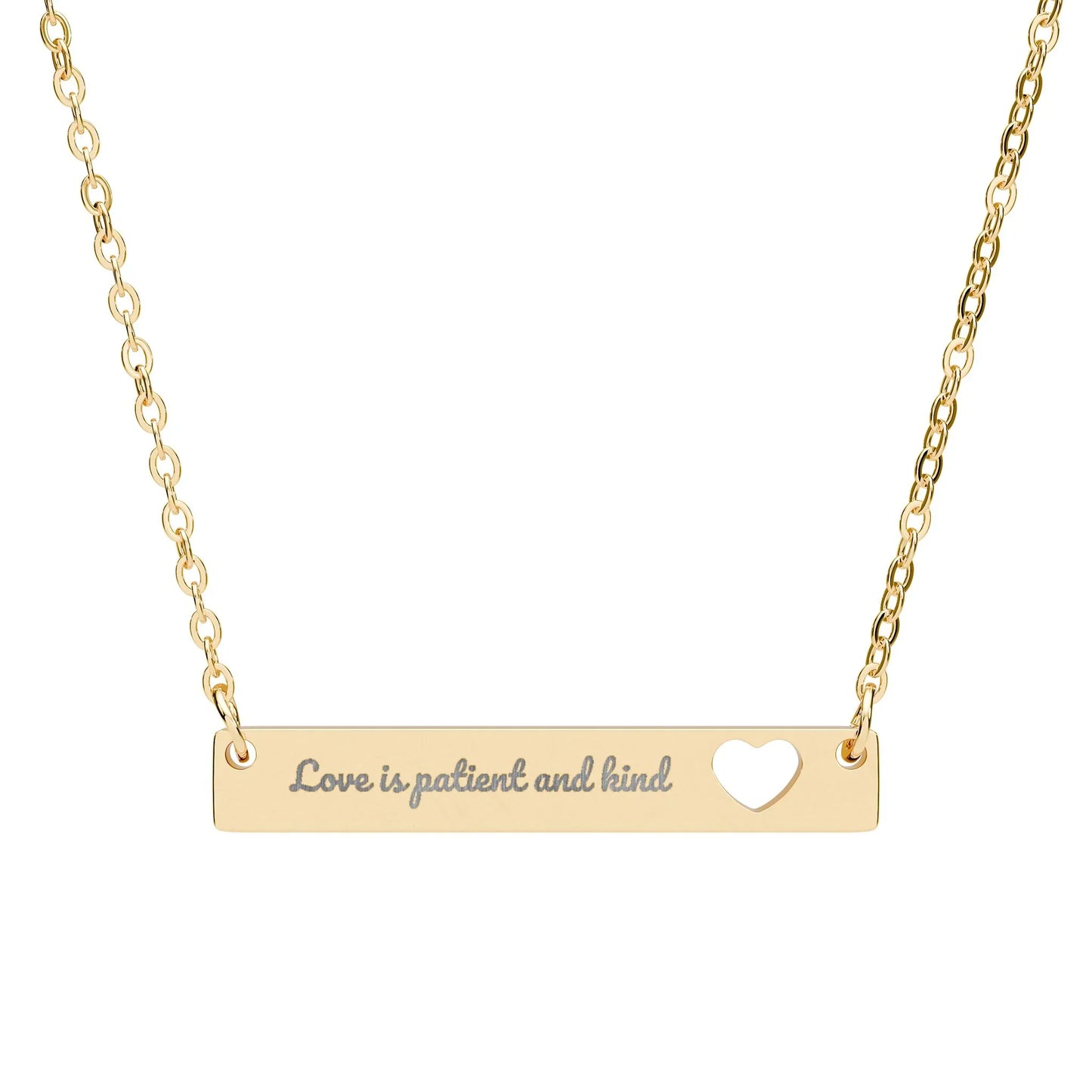 Gold bar necklace with 'Love is patient and kind' engraving and heart cutout