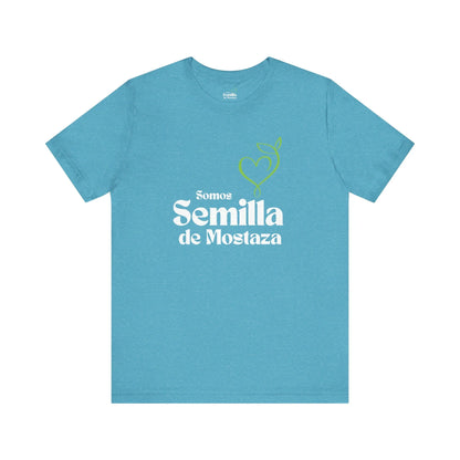 Blue Christian t-shirt with 'Somos Semilla de Mostaza' text and green heart sprout design