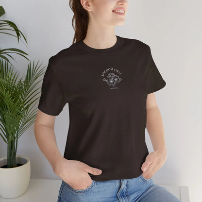 Woman wearing black Christian t-shirt with 'Kingdom First' and floral graphic, casual style