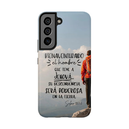 Christian phone case with Psalm 112:1-2 in Spanish, hiker on mountain, faith-inspired design