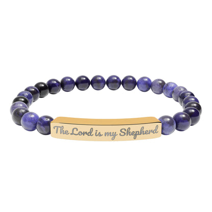 Christian bracelet with blue beads and gold bar engraved 'The Lord is my Shepherd'