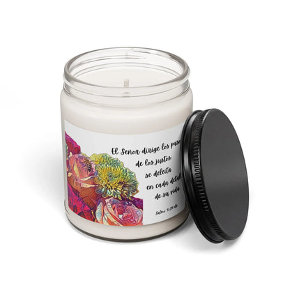 Christian scented candle in glass jar with colorful floral design and Spanish Bible verse label