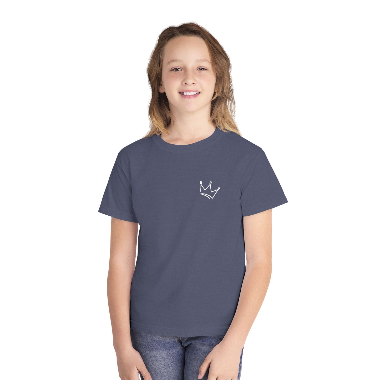 Smiling child wearing blue Christian t-shirt with white crown graphic, faith apparel