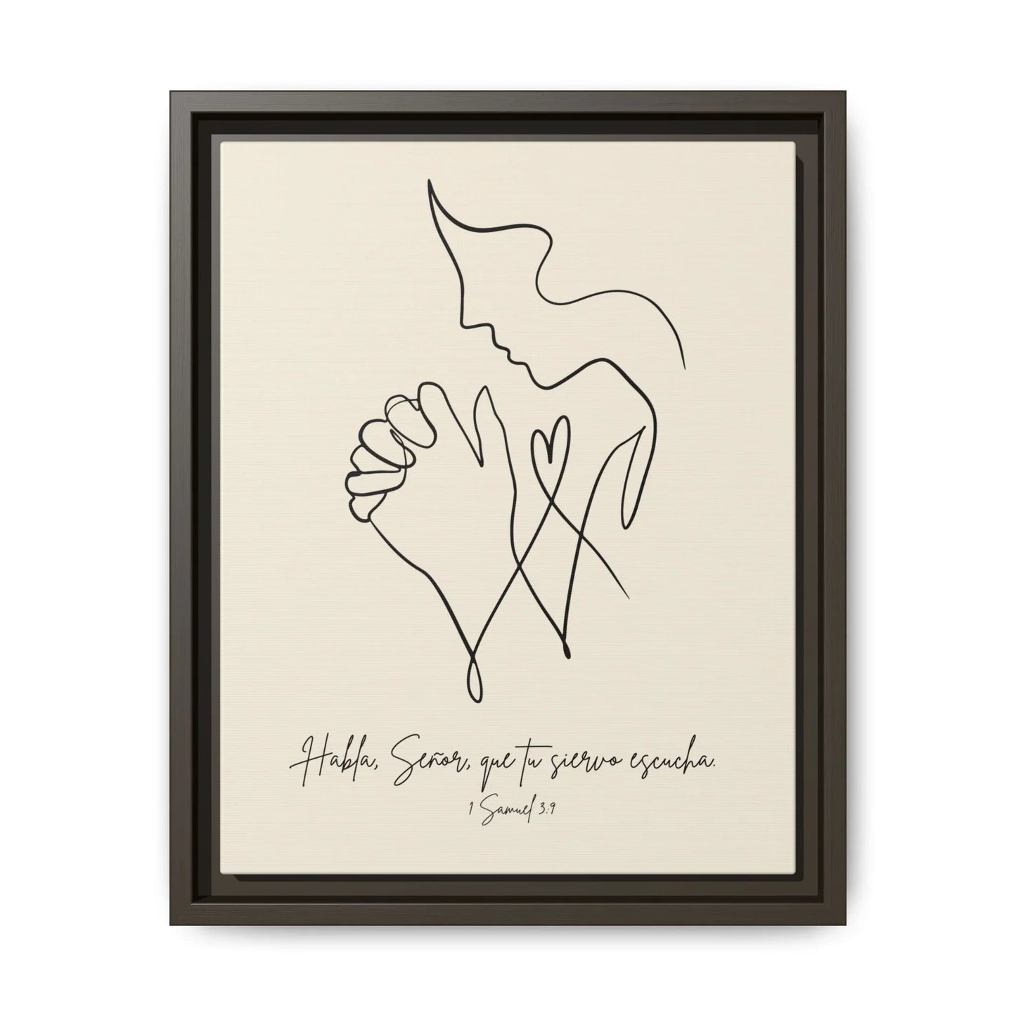 Framed Christian wall art with minimalist line drawing of praying person and Spanish Bible verse.