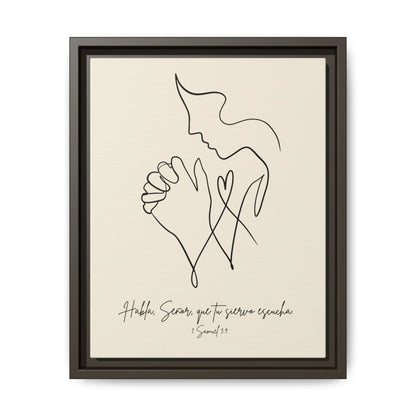 Framed Christian wall art with minimalist line drawing of praying person and Spanish Bible verse.