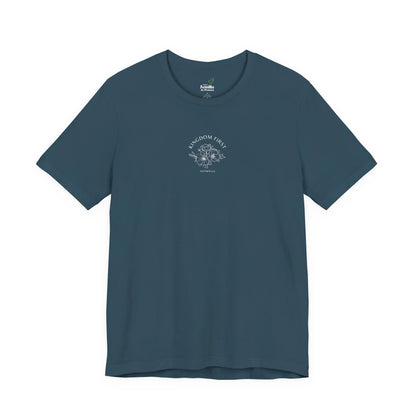 Blue Christian t-shirt with 'Kingdom First' text, floral graphic, and Matthew 6:33 scripture.