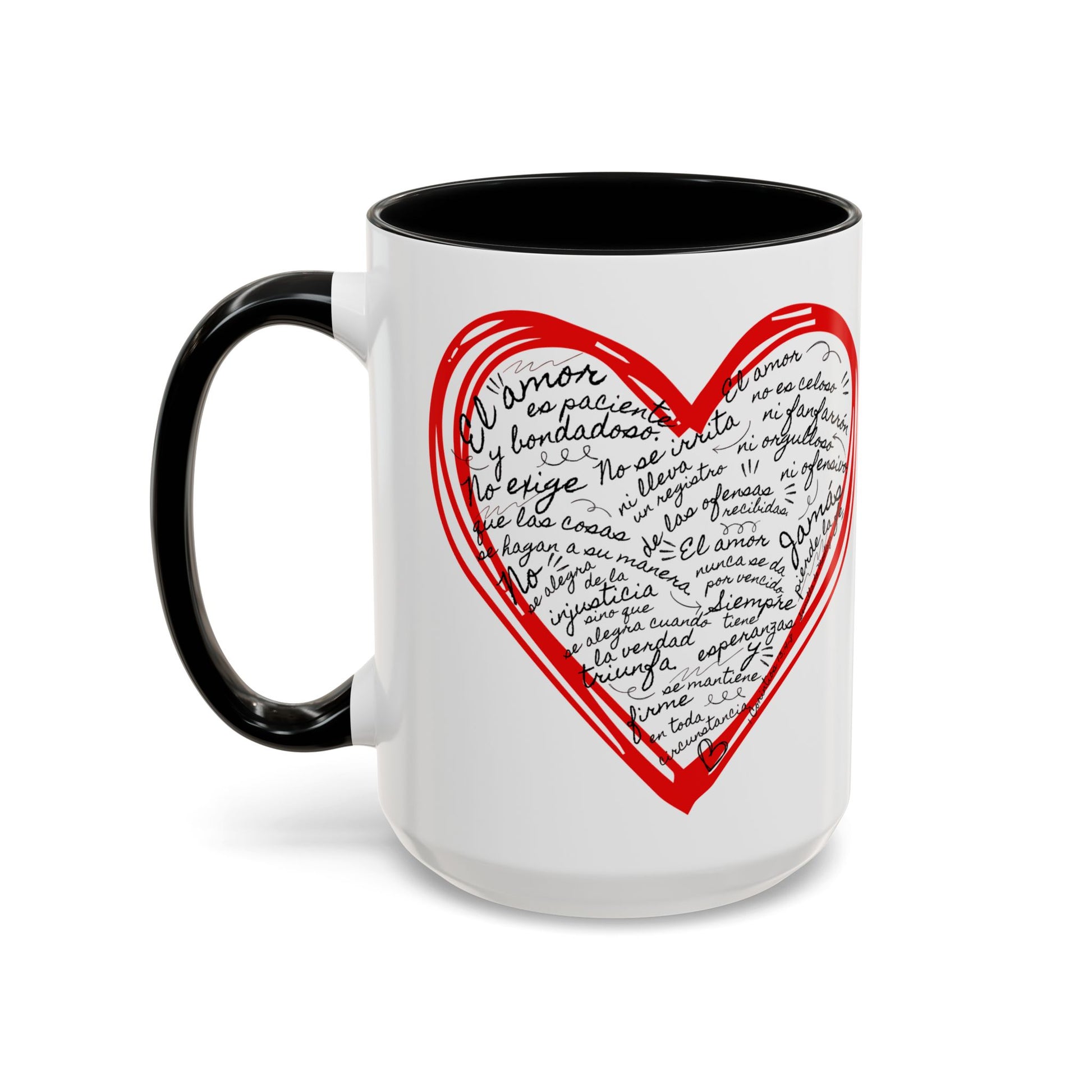 White mug with black handle, red heart graphic, and handwritten Spanish Bible verse text