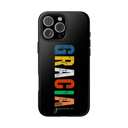 Black phone case with bold colored text reading 'GRACIA sobre gracia' and 'Juan 1:16' verse