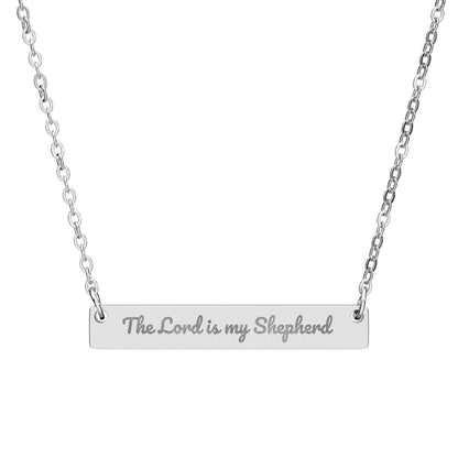 Silver Christian necklace with engraved bar reading 'The Lord is my Shepherd'