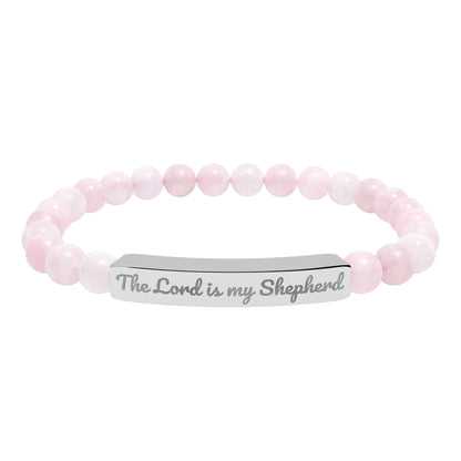 Pink bead Christian bracelet with silver bar engraved 'The Lord is my Shepherd'.