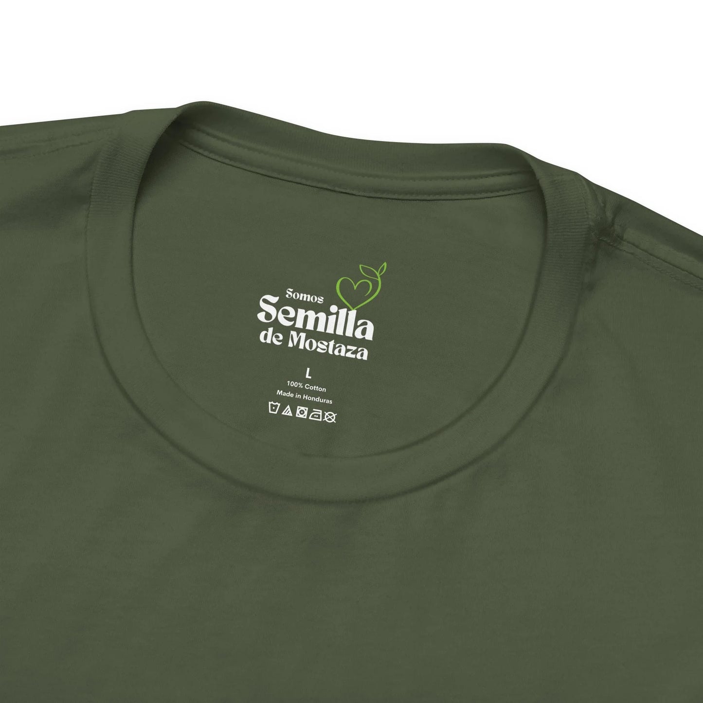 Olive green Christian t-shirt with 'Somos Semilla de Mostaza' label and care symbols.
