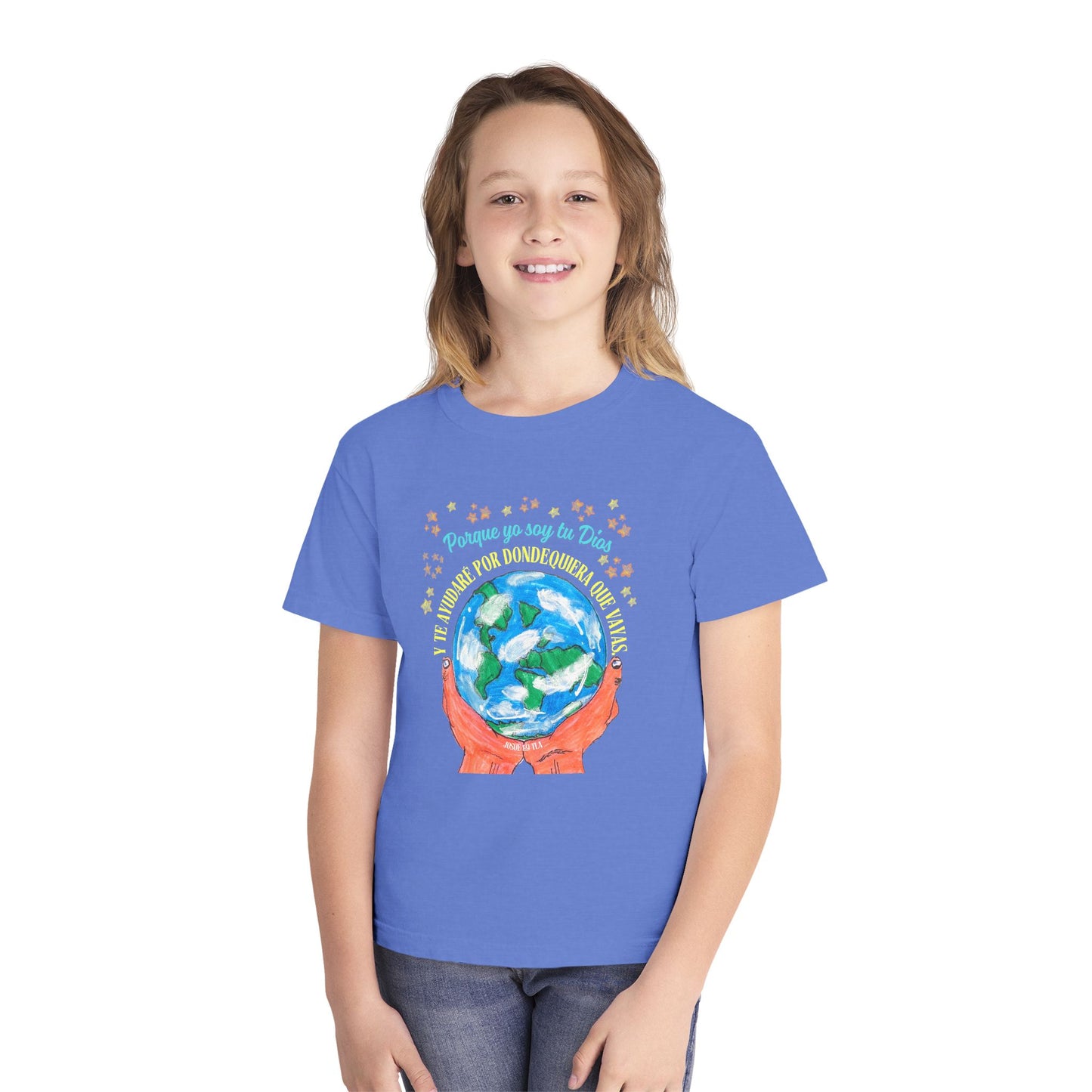 Smiling child in blue Christian t-shirt with illustrated Earth and faith-inspired Spanish text