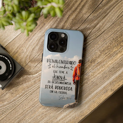 Christian phone case with Spanish Psalm 112:1-2 scripture, man on mountain, wood table background