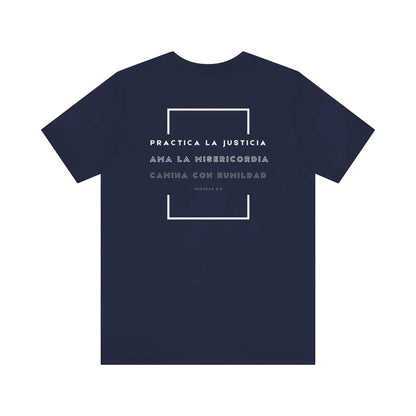 Navy blue Christian t-shirt with Spanish Micah 6:8 Bible verse and modern typography design.
