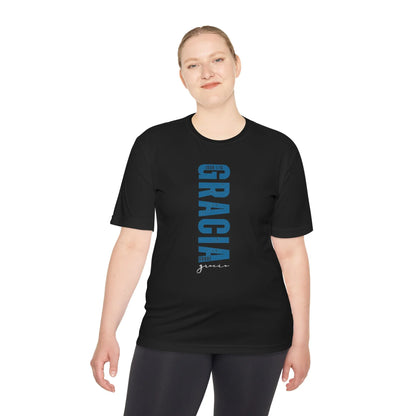 Woman wearing black Christian t-shirt with Spanish faith design and Bible verse, studio shot