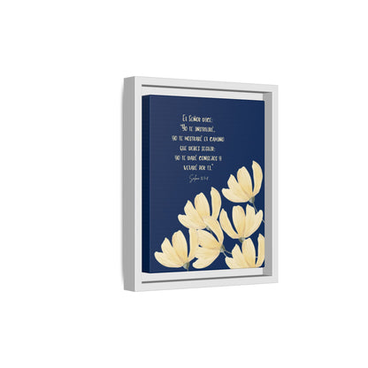 Christian wall art with Spanish Bible verse, yellow flowers, and navy blue background in a frame