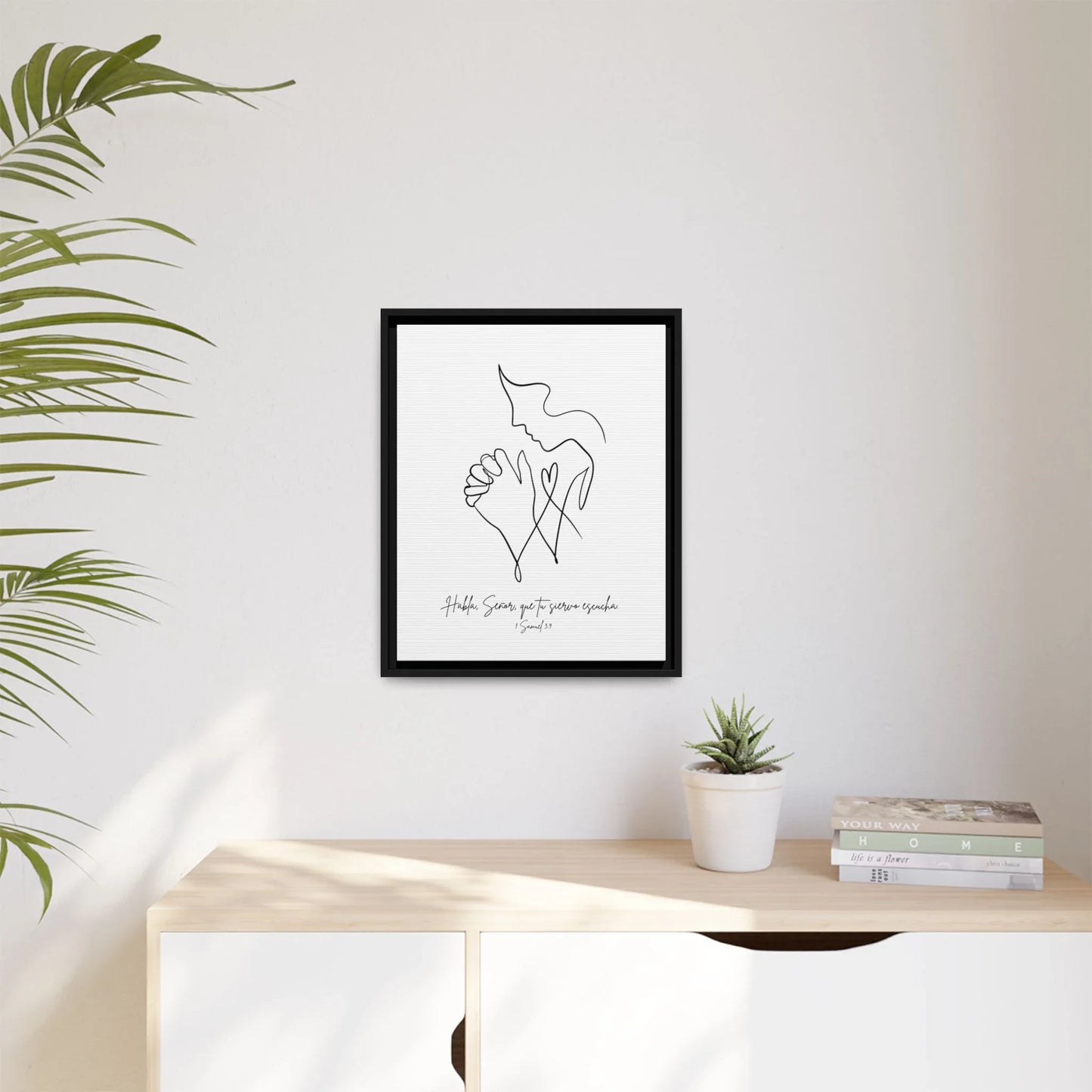 Minimalist Christian wall art with praying hands and scripture in modern home décor setting
