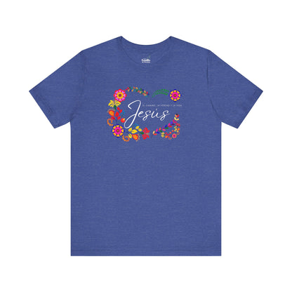 Blue Christian t-shirt with 'Jesus' and Spanish Bible verse, decorated with colorful floral design