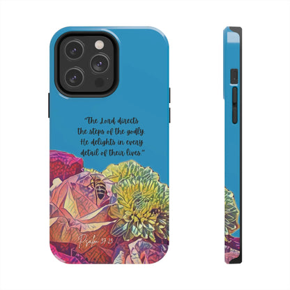 Christian phone case with colorful flowers, blue background, and Psalm 37:23 Scripture quote