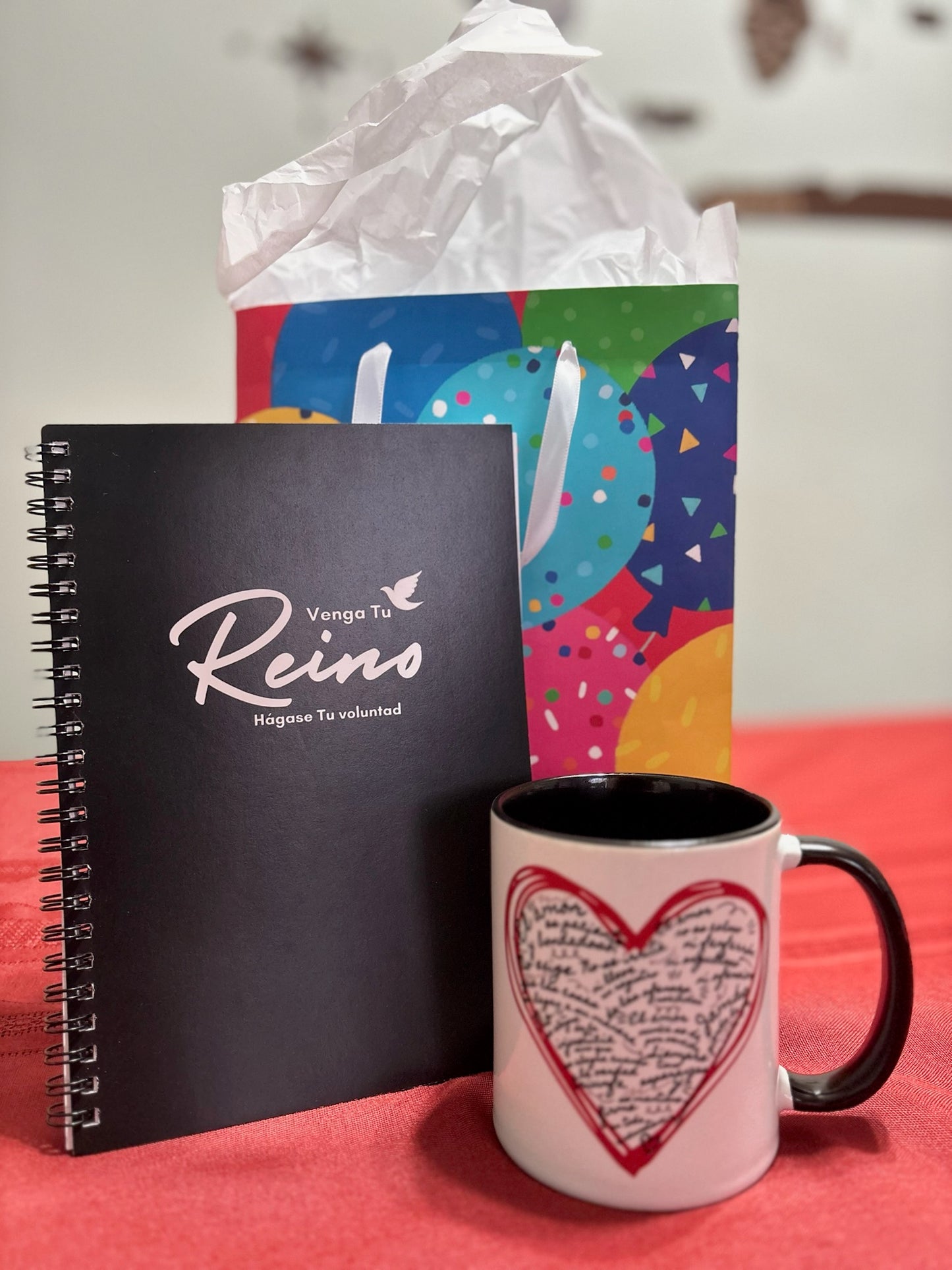 Christian gift set with Spanish prayer journal, heart mug, and colorful gift bag
