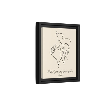 Modern Christian wall art of praying figure in black frame with Spanish Scripture calligraphy