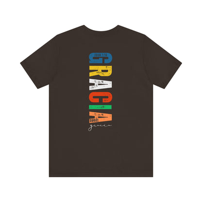 Black Christian t-shirt with colorful 'GRACIA SOBRE gracia' design and scripture Juan 1:16