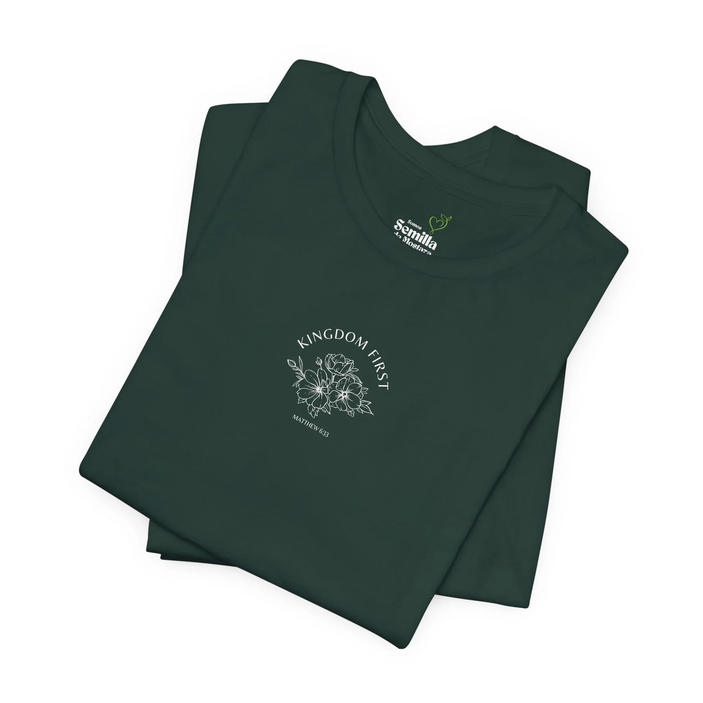 Folded dark green Christian t-shirt with 'Kingdom First' and floral design on front