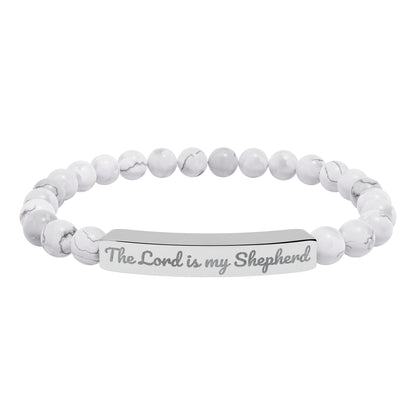 White beaded Christian bracelet with 'The Lord is my Shepherd' engraved on silver bar