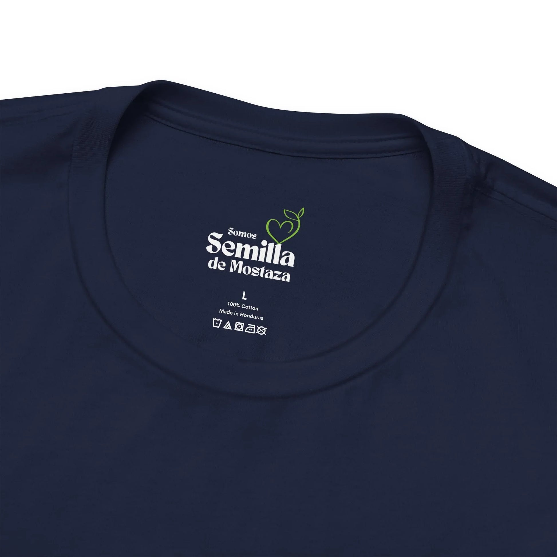 Navy blue Christian t-shirt with 'Somos Semilla de Mostaza' design inside collar