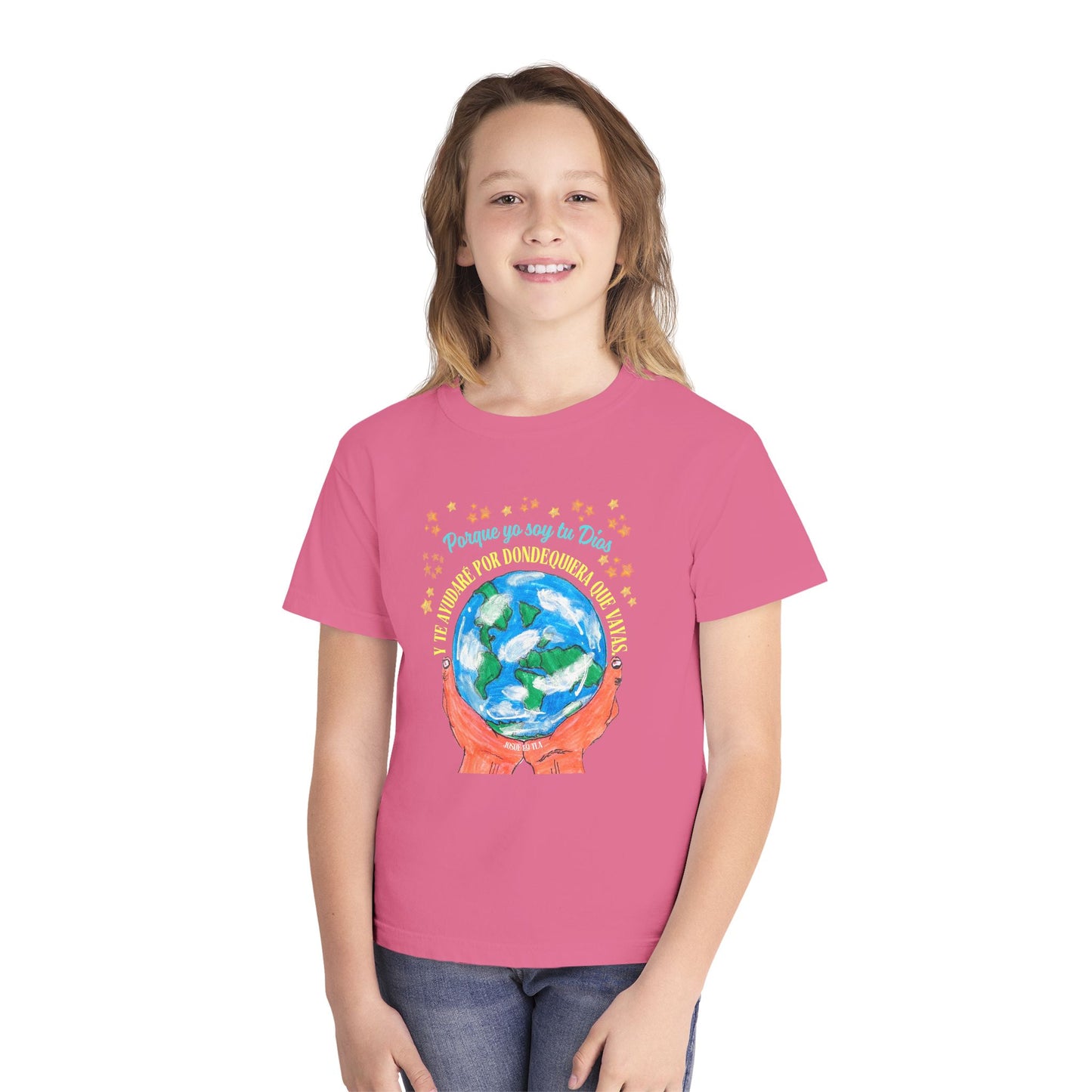 Smiling girl in pink Christian t-shirt with globe and Spanish faith quote graphic