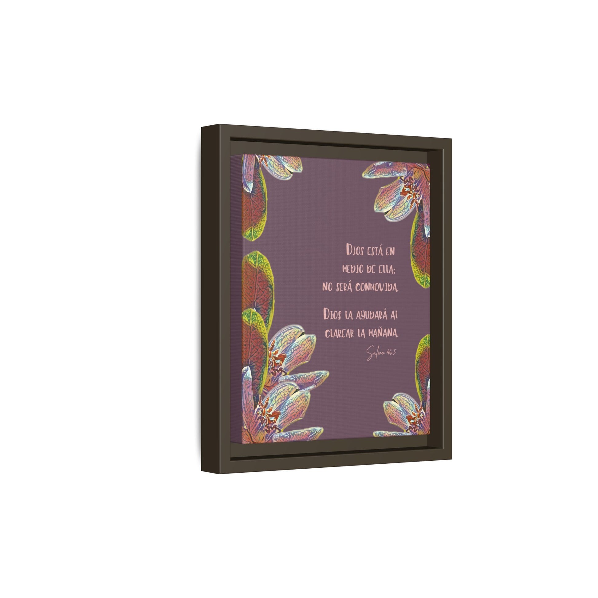 Framed Christian wall art with Spanish scripture and colorful floral accents on purple background