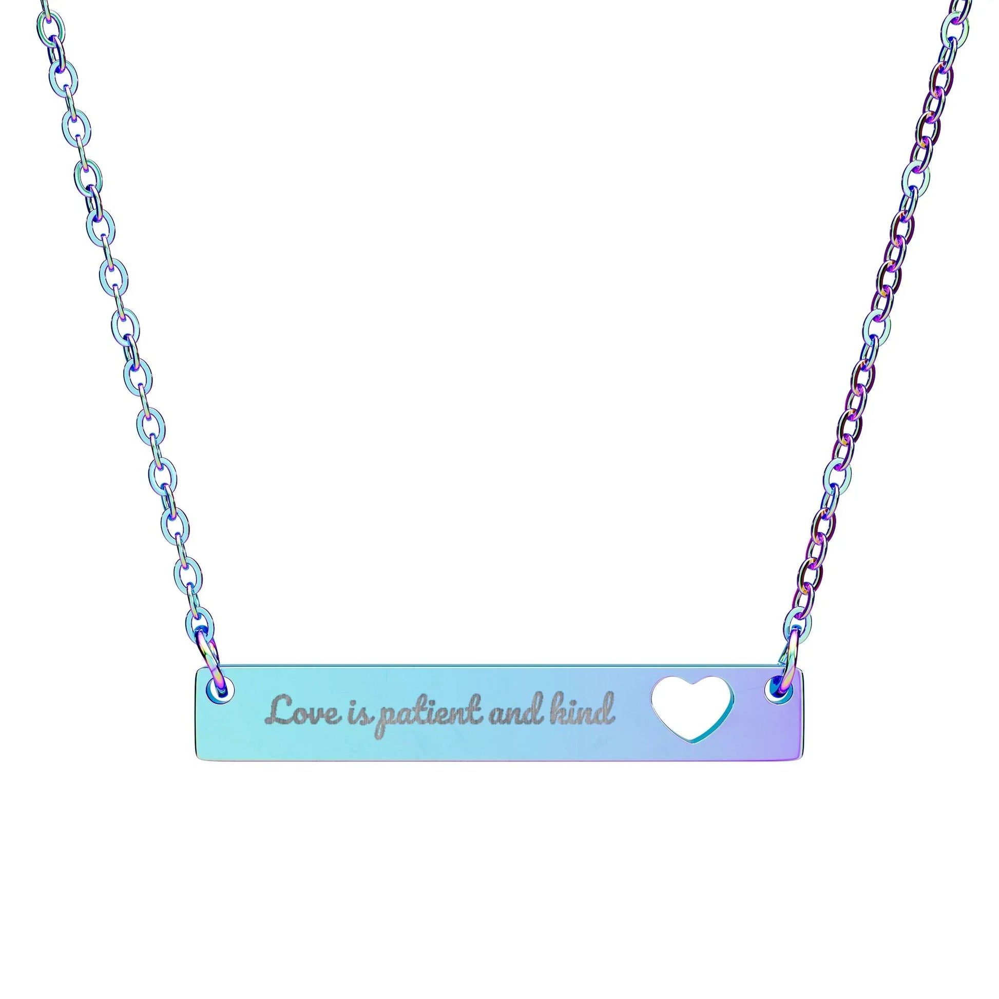 Iridescent bar necklace with 'Love is patient and kind' engraving and heart cutout.