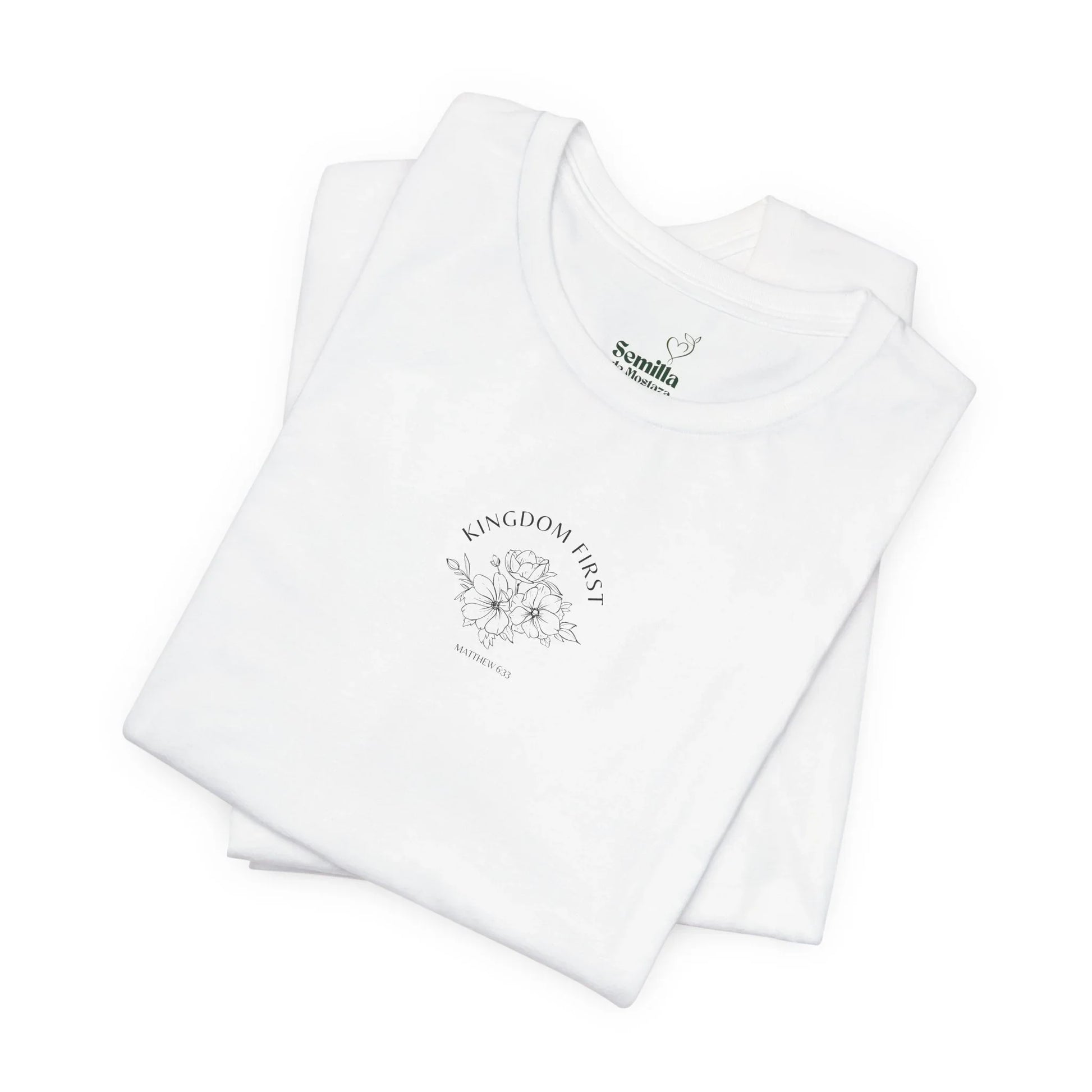 White Christian t-shirt with 'Kingdom First' floral Matthew 6:33 design, folded flat
