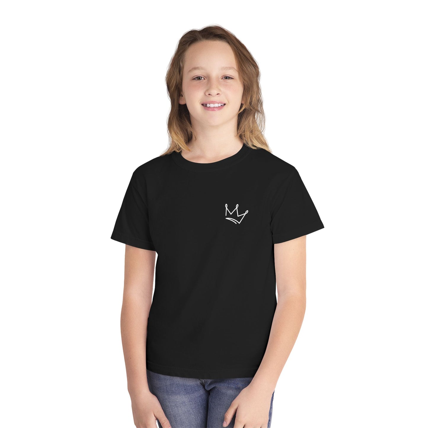 Smiling child wearing black Christian crown graphic t-shirt and jeans on white background