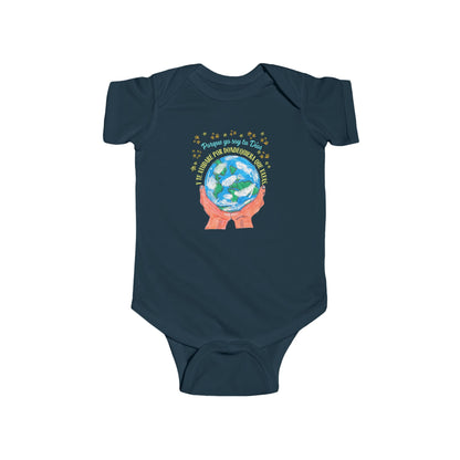 Navy blue baby onesie with illustration of hands holding Earth and Spanish Christian text