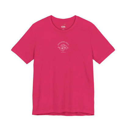 Fuchsia Christian t-shirt with 'Kingdom First' text, Matthew 6:33 verse and floral graphic