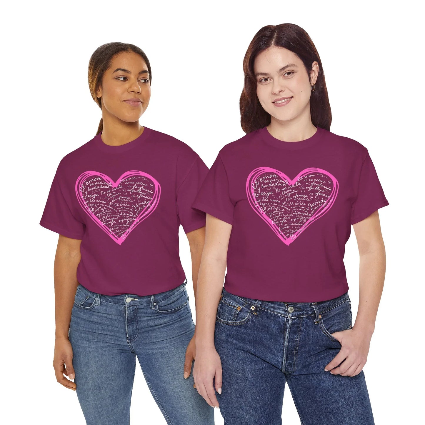 Two women wearing purple Christian t-shirts with pink heart and Spanish Scripture text.