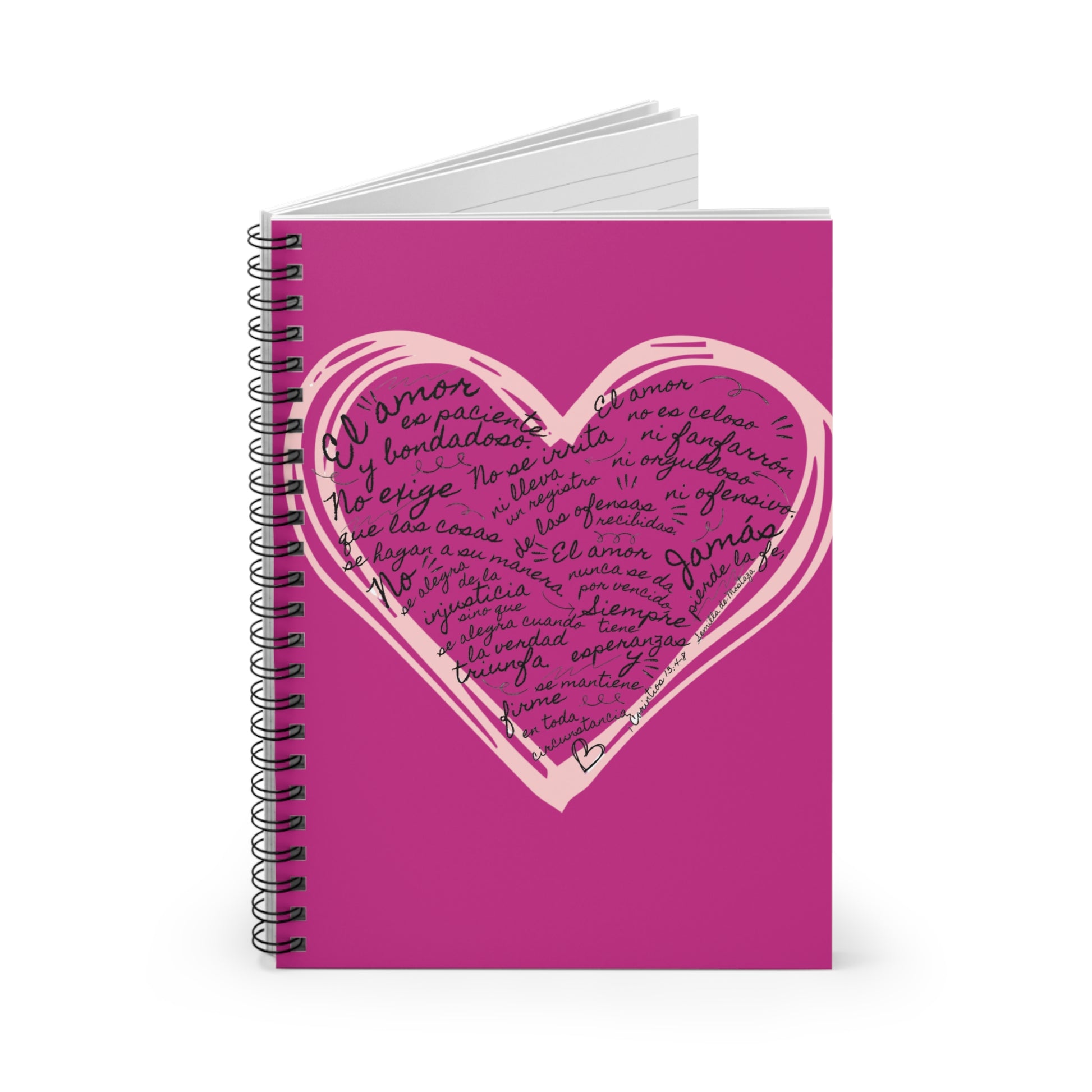 Pink Christian notebook with heart design and Spanish scripture on the cover