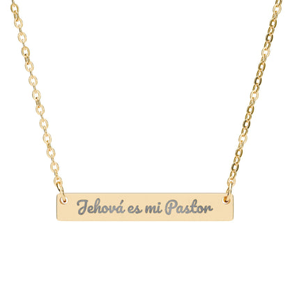 Gold necklace with engraved bar pendant reading 'Jehová es mi Pastor,' Christian jewelry