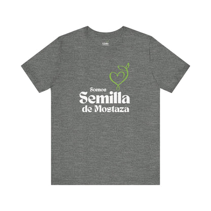 Gray Christian t-shirt with 'Somos Semilla de Mostaza' text and green heart sprout graphic.